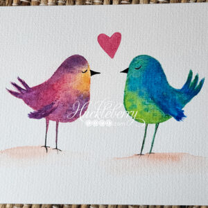 Hand-painted watercolor birds facing each other with eyes closed. Bird on the left is purple, pink, and orange, and the bird on the right is blue and green. A little pink heart is above their heads.